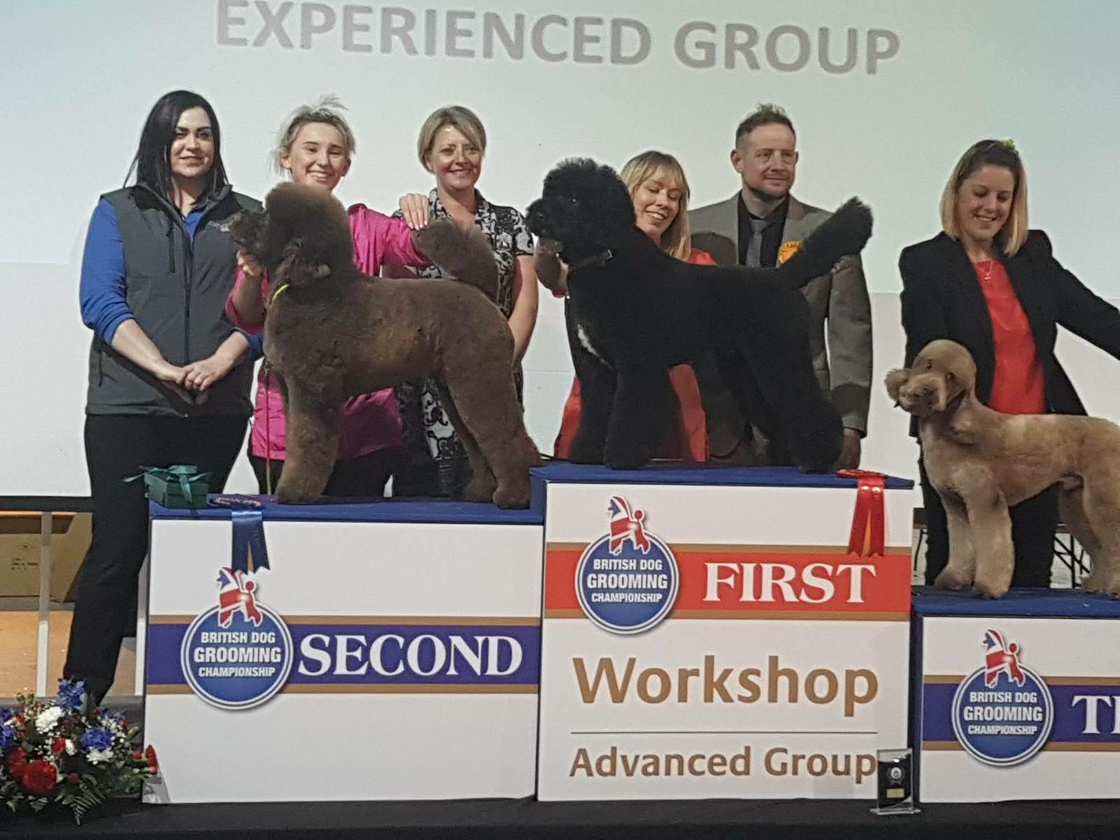 The competition podium, first place in the advanced workshop group